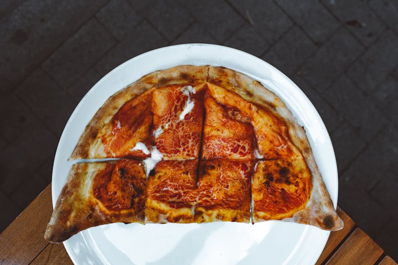 Deep dish pizza with thick crust and chunky toppings